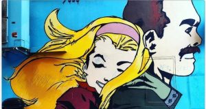 Street art a Roma: coppia di motociclisti al Pigneto